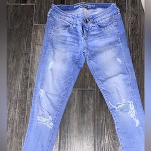 Light blue ripped skinny jeans women